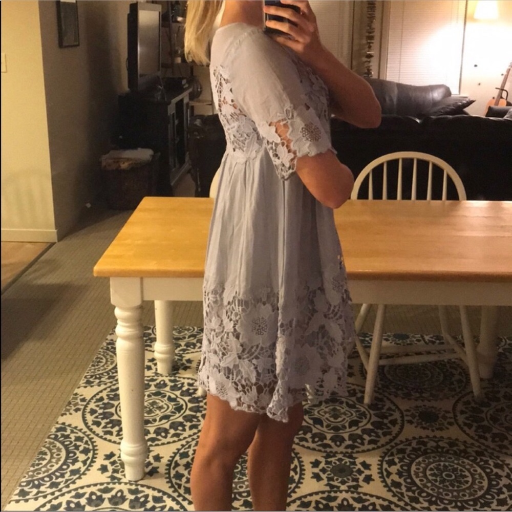 Holding horses, purple sundress